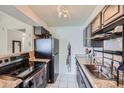 Efficient kitchen with stainless steel appliances, granite countertops, and ample storage at 384 S Ironton St # 314, Aurora, CO 80012