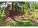 View of home's exterior, featuring a raised porch and access steps at 7256 Aspen Meadow Dr, Evergreen, CO 80439
