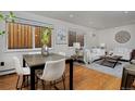 Bright living room with hardwood floors and comfy seating at 1149 Columbine St # 104, Denver, CO 80206