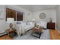 Living room features hardwood floors and modern decor at 1149 Columbine St # 104, Denver, CO 80206