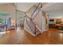 Grand entryway featuring a staircase and soaring ceilings at 10421 Kennemere Ln, Parker, CO 80134