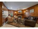 Cozy lobby area with wood paneling, a fireplace, and comfortable seating at 700 N Washington St # 402, Denver, CO 80203