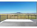 Deck with scenic mountain views at 5585 Country Club Dr, Larkspur, CO 80118