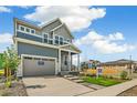 Attractive two-story home with a tidy front yard, providing an appealing view of the property at 21204 E 62Nd Ave, Aurora, CO 80019