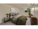 Spacious bedroom with neutral decor and large window at 1300 Golden Cir # 107, Golden, CO 80401