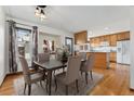 Comfortable dining area with hardwood floors and neutral-colored walls at 10208 E Jewell Ave # 18, Aurora, CO 80247