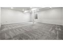 View of a large open basement with carpeted floor and recessed lighting at 9359 Russell Cir, Arvada, CO 80007