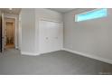Neutral bedroom with closet and natural light. Minimalist style at 4121 Mesa Top Dr, Monument, CO 80132