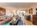 Cozy living room with lots of space, open to kitchen/dining area, and beautiful decor at 13961 E Marina Dr # 414, Aurora, CO 80014