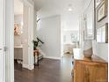 Bright entryway with hardwood floors and half bathroom at 998 Eaton St, Lakewood, CO 80214