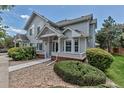 Beautiful home featuring charming curb appeal and an inviting, landscaped front yard at 4013 S Carson St # C, Aurora, CO 80014