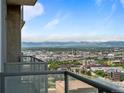Scenic balcony view overlooking the city skyline and Rocky Mountains at 891 14Th St # 2505, Denver, CO 80202