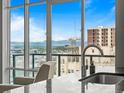 Close up shot of a countertop sink with a beautiful city view at 891 14Th St # 2505, Denver, CO 80202