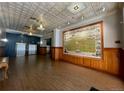 Spacious lobby with vintage elevator and map of Denver 1908 at 1555 California St # 610, Denver, CO 80202