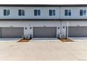Attached garages for modern townhomes in a well-planned community at 5783 N Jericho Way, Aurora, CO 80019