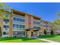 Apartment complex with well-maintained landscaping at 625 S Alton Way # 10D, Denver, CO 80247
