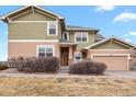 Inviting home exterior showcasing a well-maintained front yard and cozy entrance at 3672 S Perth Cir # 101, Aurora, CO 80013