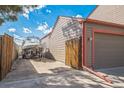 Long driveway leading to the garage, with side yard space for boat or RV parking at 11321 N Brownstone Dr, Parker, CO 80138