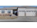 Inviting single-story home showcases an attached two-car garage and well-maintained lawn at 4971 Bross Pl, Broomfield, CO 80023