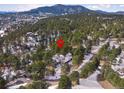 Property location shown with surrounding homes and landscape at 3028 Olympia Cir, Evergreen, CO 80439