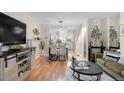 Bright dining area with table and chairs, open to the kitchen at 1811 S Quebec Way # 134, Denver, CO 80231