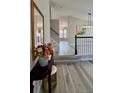 Inviting entryway with a staircase, stylish gray flooring, and modern decor, creating a warm welcome at 13612 Plaster Cir, Broomfield, CO 80023