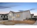 Street view of a lovely single-Gathering home with a well-manicured yard and farmhouse details at 11442 Autumn Moon St, Littleton, CO 80125
