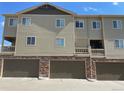 Modern townhome with private balconies and attached garages, offering comfort and convenience at 1732 Aspen Meadows Cir, Federal Heights, CO 80260