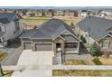 Spacious single-Gathering home with beautiful landscaping and a large backyard in a suburban neighborhood at 10987 Ouray St, Commerce City, CO 80022