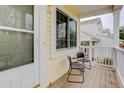 Cozy front porch with seating, offering a relaxing outdoor space at 20626 Willowbend Ln, Parker, CO 80138