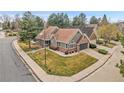 Attractive home on a corner lot, showcasing a well-maintained lawn at 2295 S Depew St, Denver, CO 80227