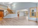 Spacious living room with abundant natural light, light blue walls, and modern flooring at 9983 Cottoncreek Dr, Highlands Ranch, CO 80130