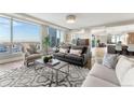 Bright and airy living room featuring floor-to-ceiling windows and city views at 2001 Lincoln St # 2524, Denver, CO 80202
