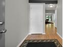 Inviting entryway with wood floors and neutral walls creating a bright and open space at 5283 Union Ct # 8, Arvada, CO 80002