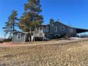 Ranch style home on a large lot with a detached garage and mountain views at 12505 N 3Rd St, Parker, CO 80134