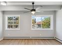 Bright bedroom with hardwood floors and large windows at 590 N Logan St # 210, Denver, CO 80203