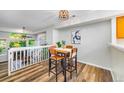 Cozy dining area adjacent to the living room, perfect for casual meals at 8199 Welby Rd # 4106, Denver, CO 80229