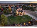 Luxury home with expansive lawn and distant views at 5268 Talavero Pl, Parker, CO 80134