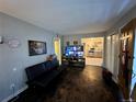 View of living room, kitchen and hardwood floors at 11856 E 7Th Ave, Aurora, CO 80010