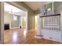 Spacious living room with hardwood floors and a fireplace at 471 N Humboldt St, Denver, CO 80218