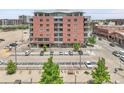Exterior of a well-maintained brick apartment building with on-site parking for residents at 2229 Blake St # 505, Denver, CO 80205