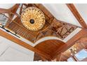 High-ceiling entryway with large stained glass light fixture at 13326 Kuehster Rd, Littleton, CO 80127