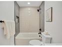 Modern bathroom with stylish tiling and a sleek shower head at 1226 W 98Th Ave, Northglenn, CO 80260