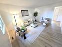 Bright living room featuring modern decor, stylish furnishings, and ample natural light at 5721 W 92Nd Ave # 66, Westminster, CO 80031