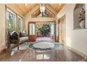 Bright entryway with double doors and wood floors at 187 Fox Ridge Dr, Evergreen, CO 80439