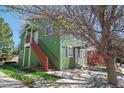 Charming two-story home with a private entrance and lush landscaping surrounding the property at 3228 W Girard Ave # C, Englewood, CO 80110