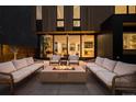 Cozy backyard featuring a modern fire pit, plush outdoor seating, and sleek landscaping at 580 S Franklin St, Denver, CO 80209