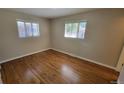 Bright bedroom with hardwood floors and ample closet space at 2998 S York St, Denver, CO 80210