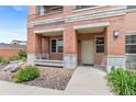 Welcoming entrance with a cozy porch and a well-lit doorway to the inviting home at 4100 Albion St # 614, Denver, CO 80216