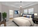 Cozy main bedroom with soft lighting, ensuite bath and large window for natural light at 3678 Shadow Cir, Castle Rock, CO 80109